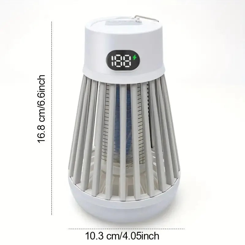 Portable bug zapper lamp hanging outdoors on patio at night