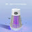 Electric insect killer lamp glowing with UV light in dark setting