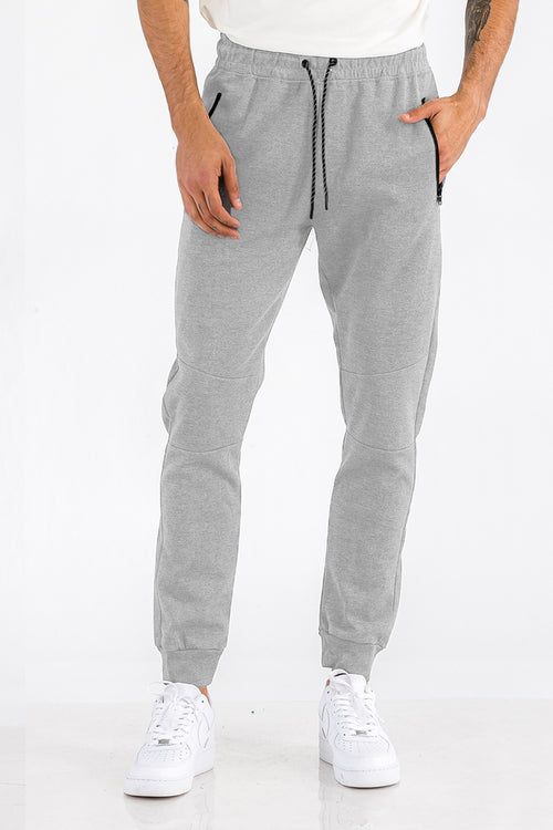 Men's heathered joggers with elastic ankle cuffs and tapered fit, side view
